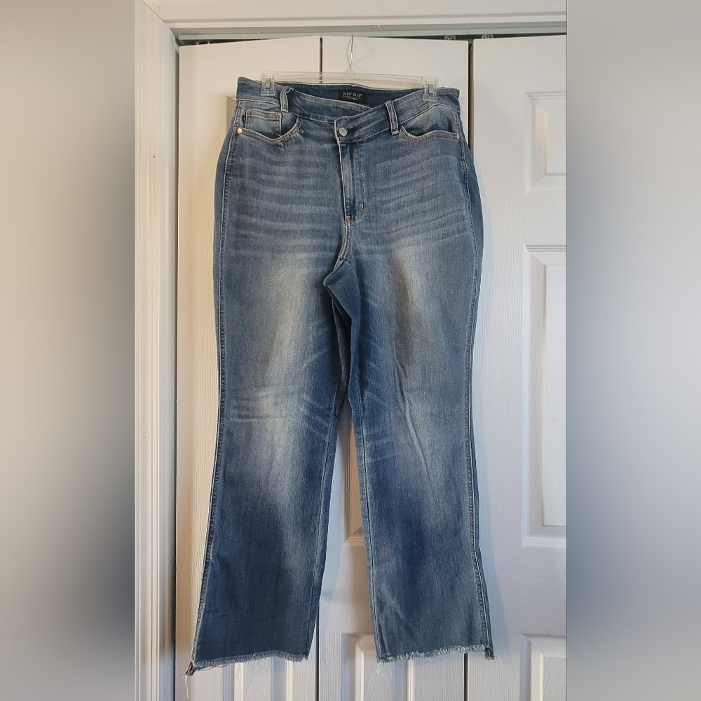 LIKE NEW medium blue dad jeans feature a high-rise cross-over waistband
